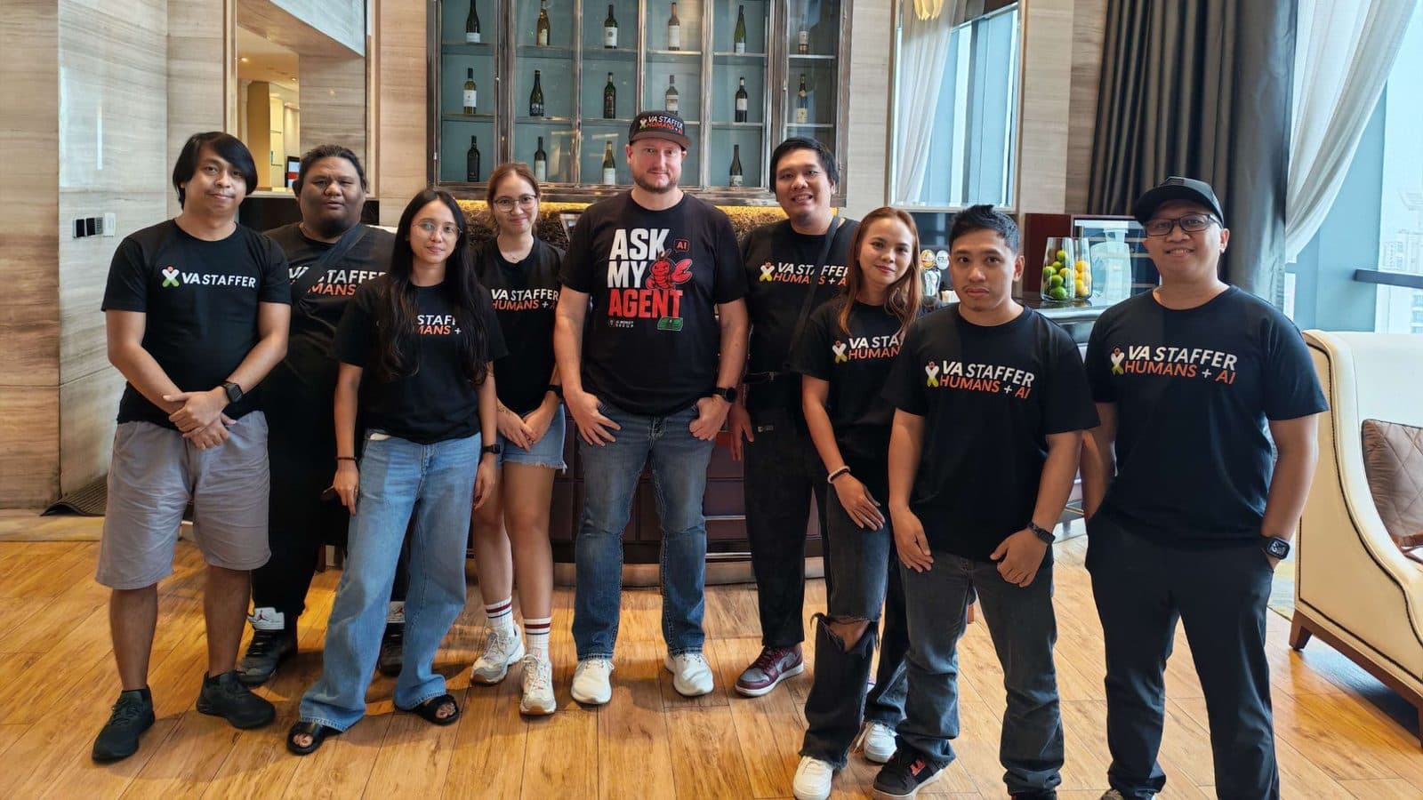 Jeff J Hunter with the VA Staffer AI Specialist team in Humans + AI shirts
