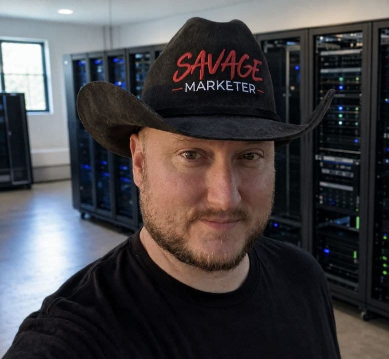 Jeff J Hunter in a Savage Marketer hat in front of the server racks his AI Employee runs on